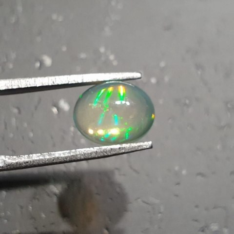 Opal from Ethiopia cabochon 9.05x7.19 mm no 118 Opal from Ethiopia cabochon 9.05x7.19 mm no 118