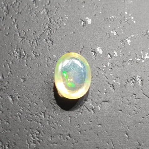 Opal from Ethiopia cabochon 9.05x7.19 mm no 118 Opal from Ethiopia cabochon 9.05x7.19 mm no 118