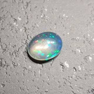 Opal from Ethiopia cabochon 9.07x6.98 mm no 134