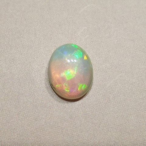 Opal from Ethiopia cabochon 9.07x7.11 mm no. 119 Opal from Ethiopia cabochon 9.07x7.11 mm no. 119