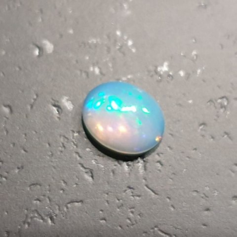 Opal from Ethiopia cabochon 9.17x7.21 mm no 113 Opal from Ethiopia cabochon 9.17x7.21 mm no 113