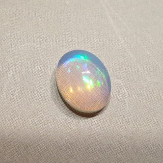 Opal from Ethiopia cabochon 9.17x7.21 mm no 113