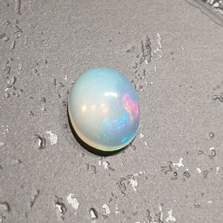 Opal from Ethiopia cabochon 9.17x7.21 mm no 133