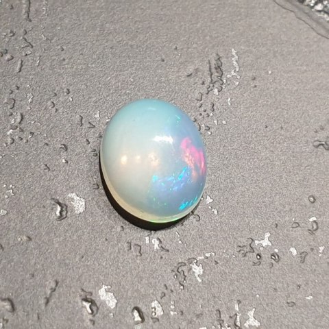 Opal from Ethiopia cabochon 9.17x7.21 mm no 133