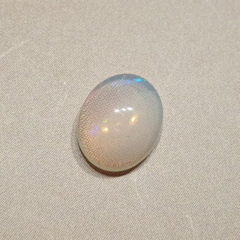 Opal from Ethiopia cabochon 9.17x7.21 mm no 133
