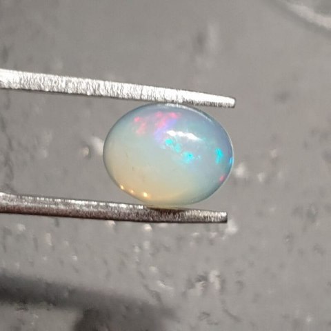Opal from Ethiopia cabochon 9.17x7.21 mm no 133