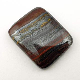 Tiger iron cabochon 26x21 mm no. 73