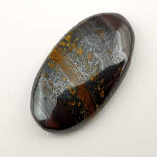 Tiger iron cabochon 31x17 mm no. 80