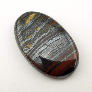 Tiger iron cabochon 31x20 mm no. 64