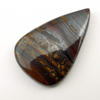 Tiger iron cabochon 33x22 mm no. 54