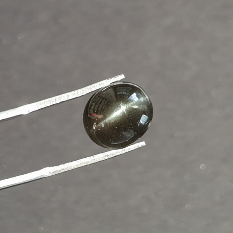 Scapolite cat's eye cabochon 11x10 mm no 14 Scapolite cat's eye cabochon 11x10 mm no 14