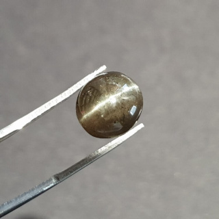 Skapolit kocie oko kaboszon 11x10 mm nr 24