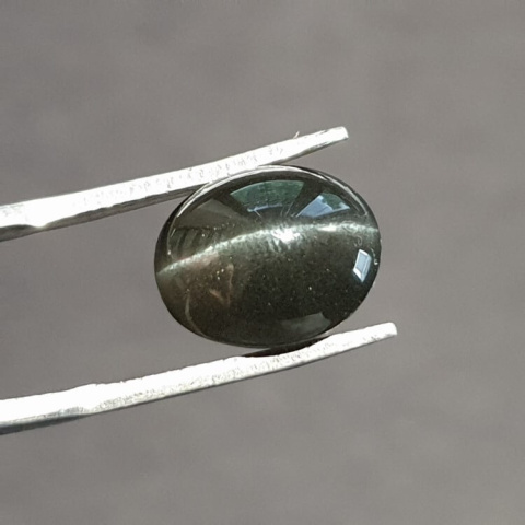 Scapolite cat's eye cabochon 12x10 mm no 7 Scapolite cat's eye cabochon 12x10 mm no 7