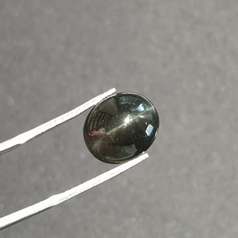 Scapolite cat's eye cabochon 12x11 mm no 22 Scapolite cat's eye cabochon 12x11 mm no 22