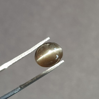 Skapolit kocie oko kaboszon 9x8 mm nr 26