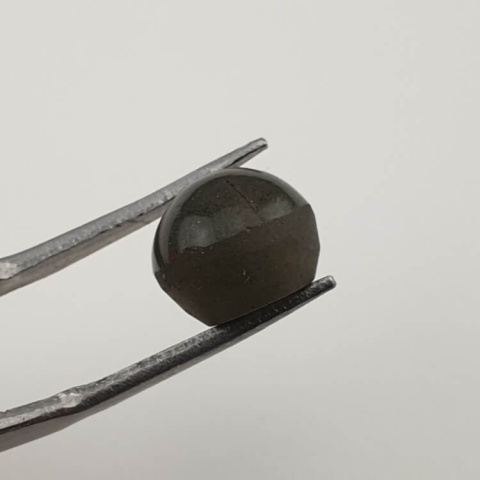 Scapolite cat's eye cabochon dia. 10x mm no 23 Scapolite cat's eye cabochon dia. 10x mm no 23