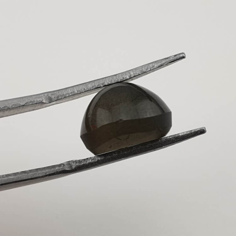 Scapolite cat's eye cabochon fi 11 mm no 25 Scapolite cat's eye cabochon fi 11 mm no 25