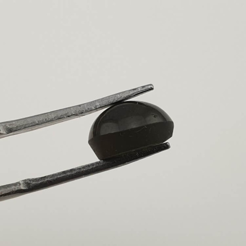 Scapolite cat's eye cabochon fi 9x mm no. 28 Scapolite cat's eye cabochon fi 9x mm no. 28