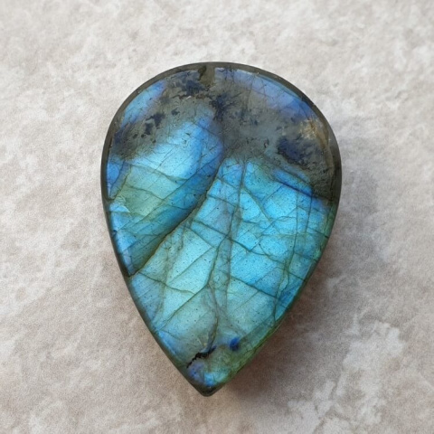 Labradorite cabochon carved 31x22 mm no. 89 Labradorite cabochon carved 31x22 mm no. 89