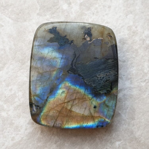Labradorite cabochon carved 31x25 mm no. 68 Labradorite cabochon carved 31x25 mm no. 68