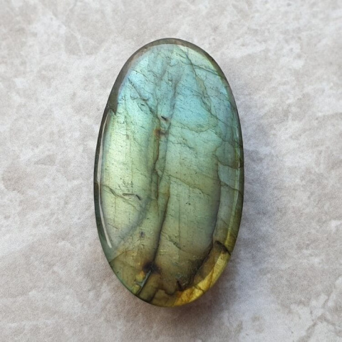 Labradorite cabochon carved 35x19 mm no 106 Labradorite cabochon carved 35x19 mm no 106