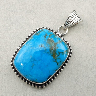 Magnesite turquoise pendant 24x20 mm no. 16
