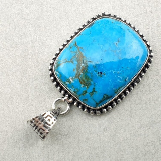 Magnesite turquoise pendant 24x20 mm no. 16