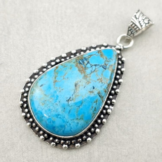 Magnesite turquoise pendant 32x21 mm no. 15