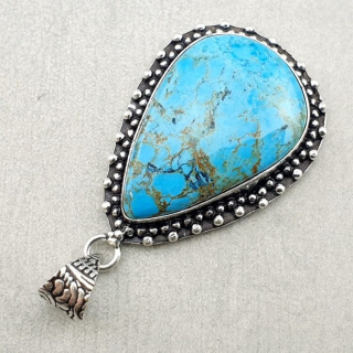 Magnesite turquoise pendant 32x21 mm no. 15