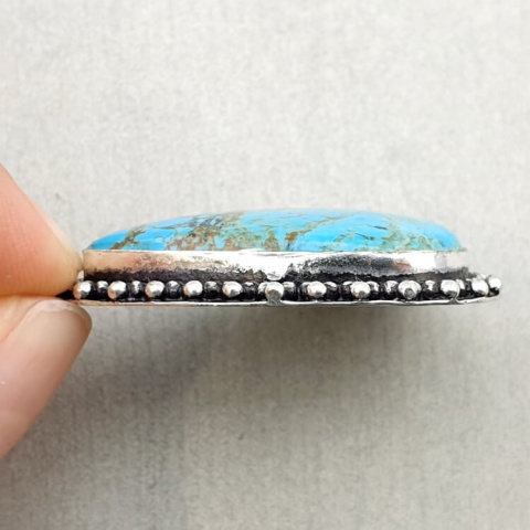 Magnesite turquoise pendant 32x21 mm no 15 Magnesite turquoise pendant 32x21 mm no 15