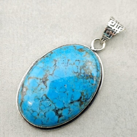 Magnesite turquoise pendant 32x22 mm no 10 Magnesite turquoise pendant 32x22 mm no 10