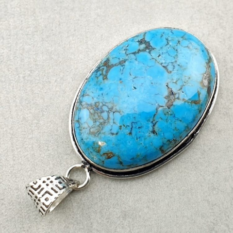 Magnesite turquoise pendant 32x22 mm no 10 Magnesite turquoise pendant 32x22 mm no 10