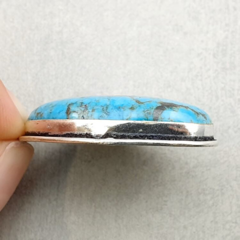 Magnesite turquoise pendant 32x22 mm no 10 Magnesite turquoise pendant 32x22 mm no 10