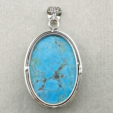 Magnesite turquoise pendant 32x22 mm no 10 Magnesite turquoise pendant 32x22 mm no 10