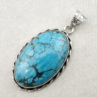 Magnesite turquoise pendant 33x20 mm no. 1