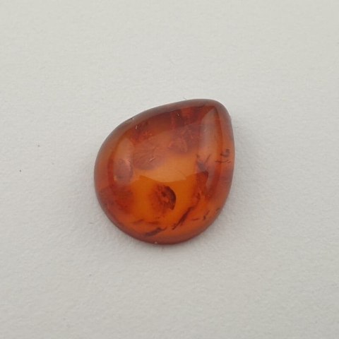 Bursztyn bałtycki kaboszon 12x10 mm nr 324 Bursztyn bałtycki kaboszon 12x10 mm nr 324