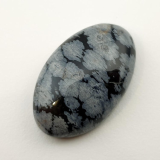 Snow obsidian cabochon 27x17 mm no 49